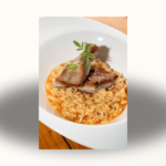 Arroz meloso de atún en manteca colorá al amontillado