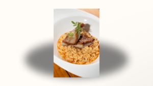 Arroz meloso de atún en manteca colorá al amontillado